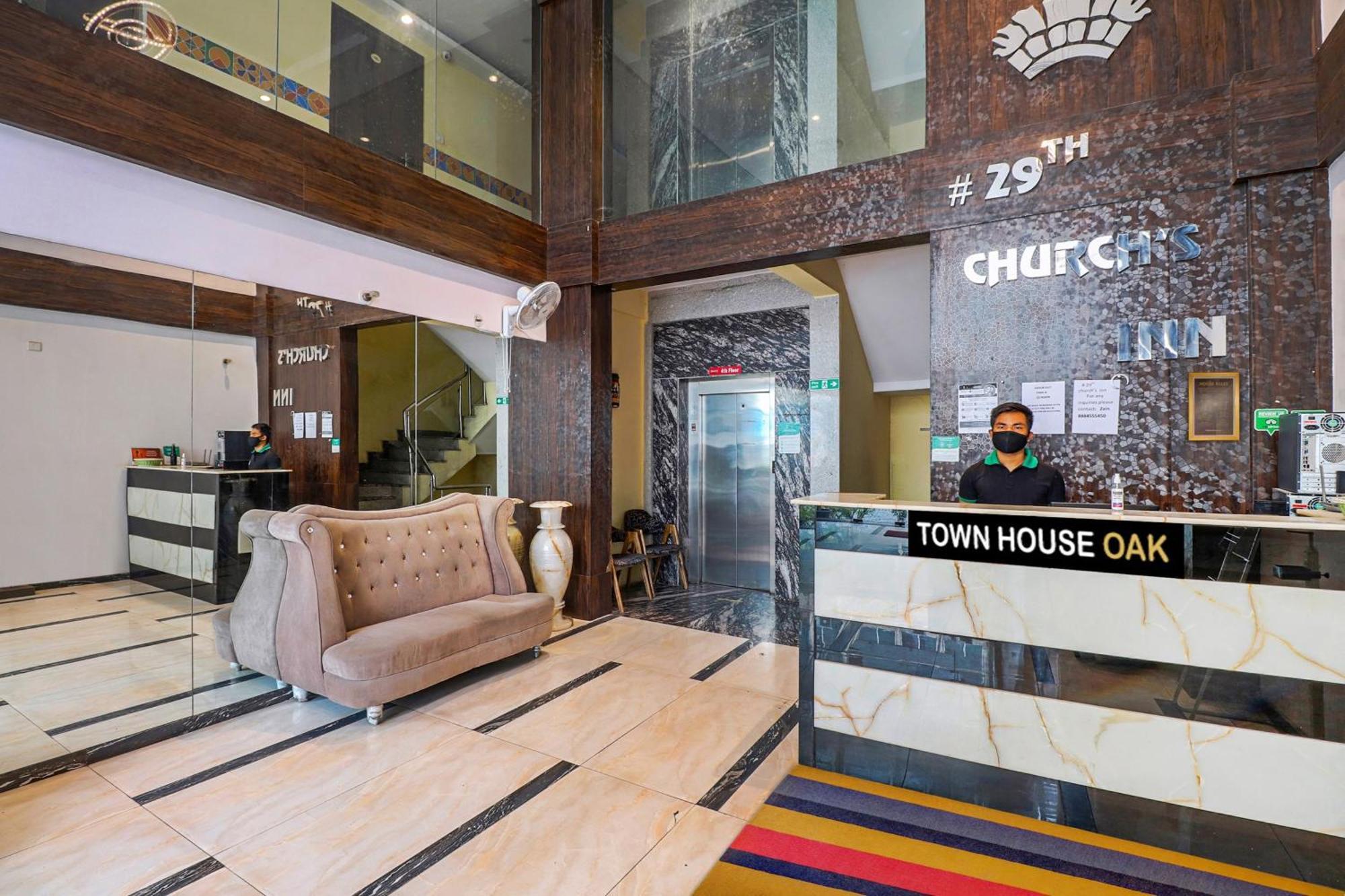 העיר בנגלור Collection O 29 Church'S Inn Near Cubbon Park מראה חיצוני תמונה